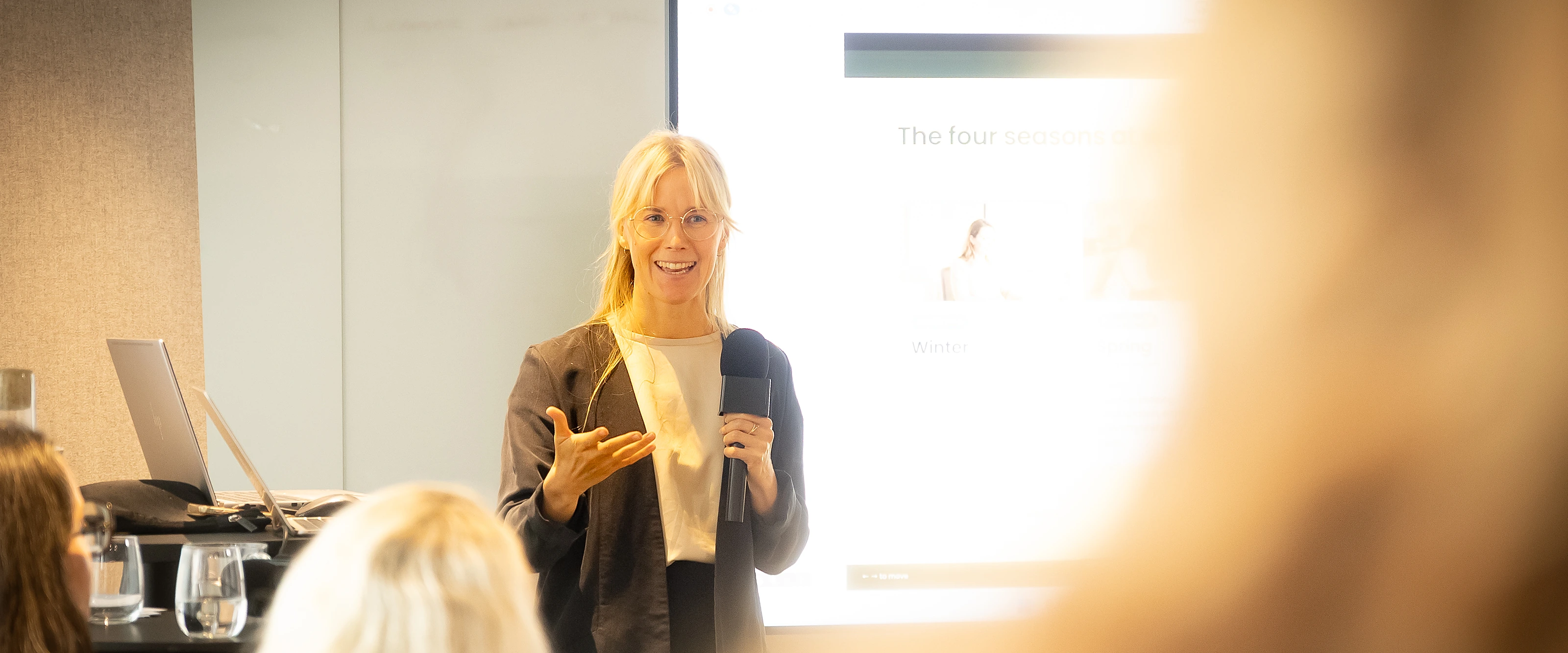 A speaker from Aumla talking about women's health at work to Capgemini employees